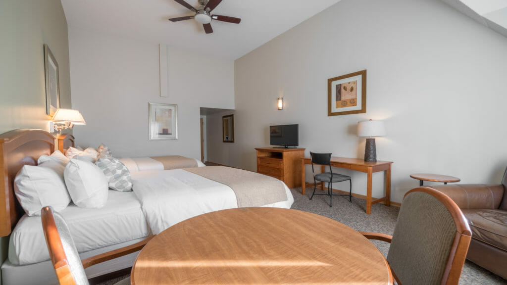 The Premium Room offers plenty of space, two queen size beds, comfortable sitting area, air conditioning, cable television, free Wi-Fi, mini fridge, coffee maker, a hair dryer, iron and board.